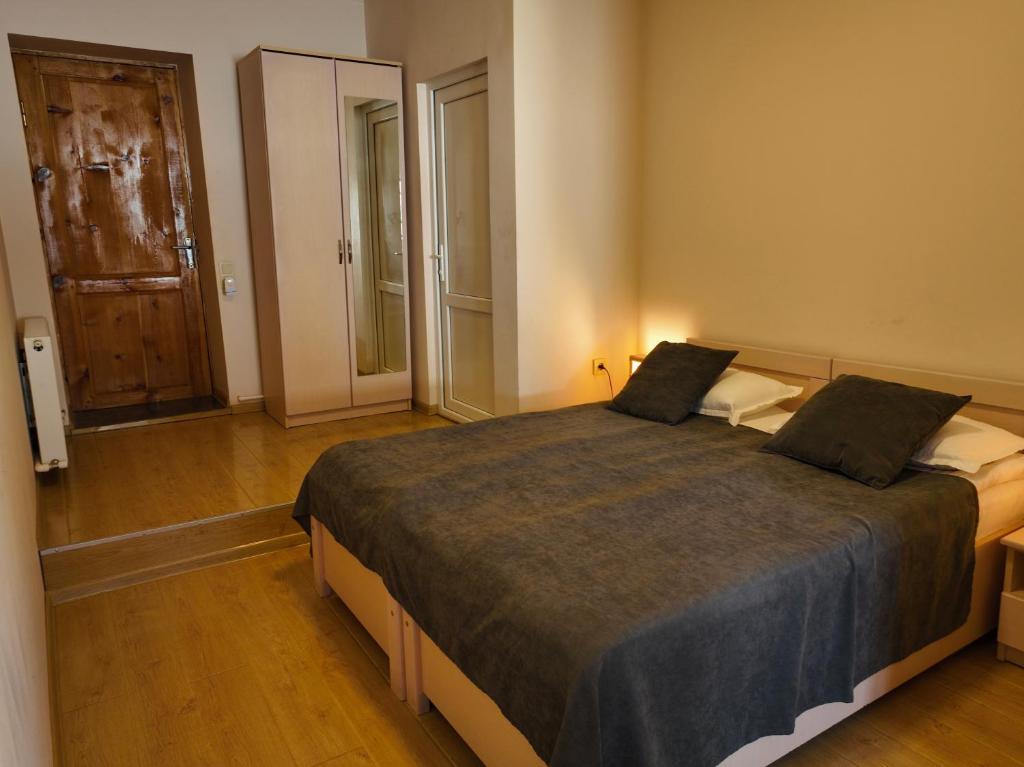 Postel nebo postele na pokoji v ubytování Guesthouse Lanchvali