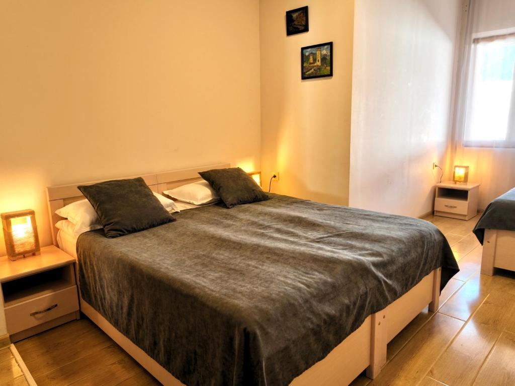 Postel nebo postele na pokoji v ubytování Guesthouse Lanchvali