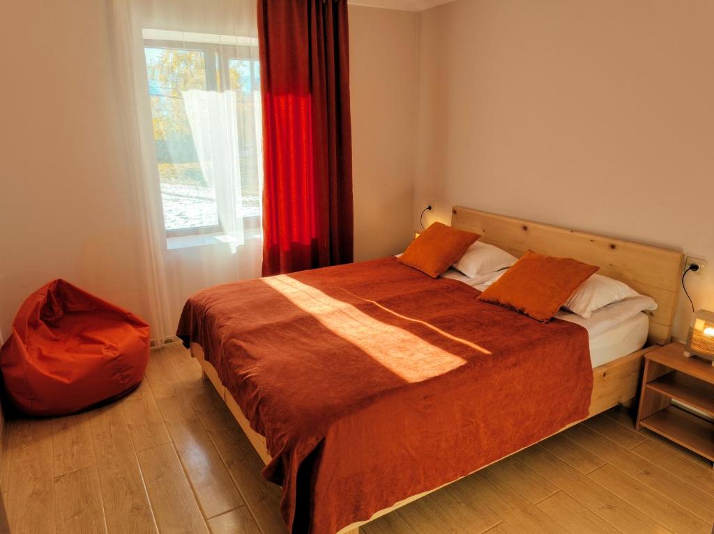 Postel nebo postele na pokoji v ubytování Guesthouse Lanchvali