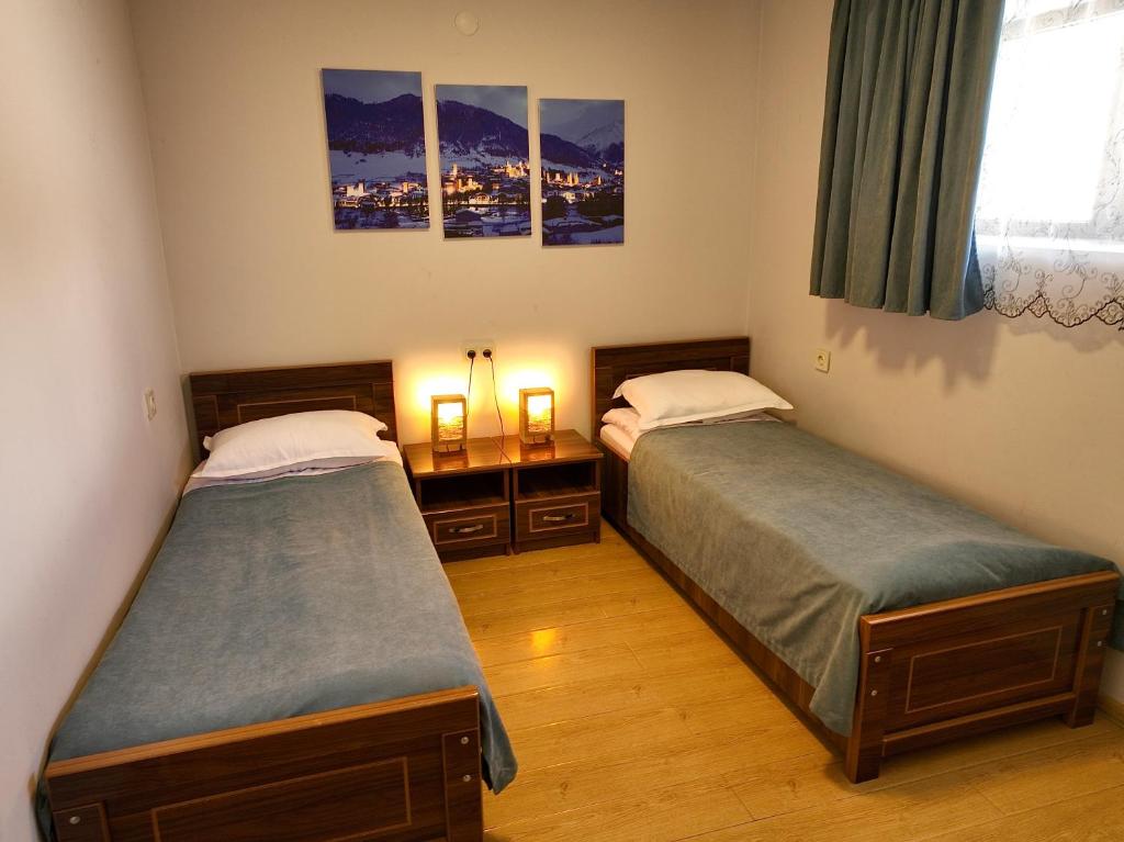 Postel nebo postele na pokoji v ubytování Guesthouse Lanchvali
