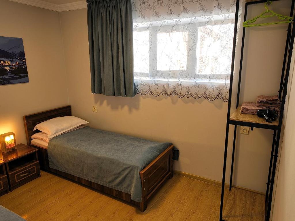 Postel nebo postele na pokoji v ubytování Guesthouse Lanchvali