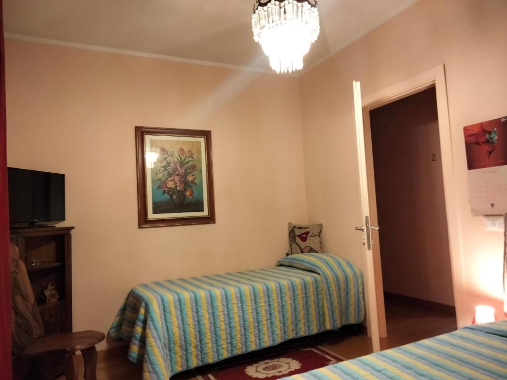 Łóżko lub łóżka w pokoju w obiekcie Bed And Breakfast Loriana