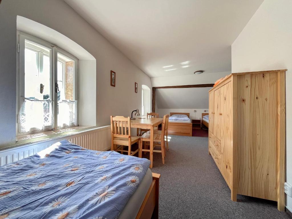 Postel nebo postele na pokoji v ubytování Domeček Lyžáku