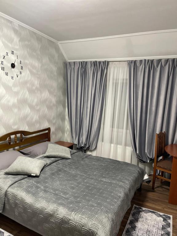 Postel nebo postele na pokoji v ubytování Best House
