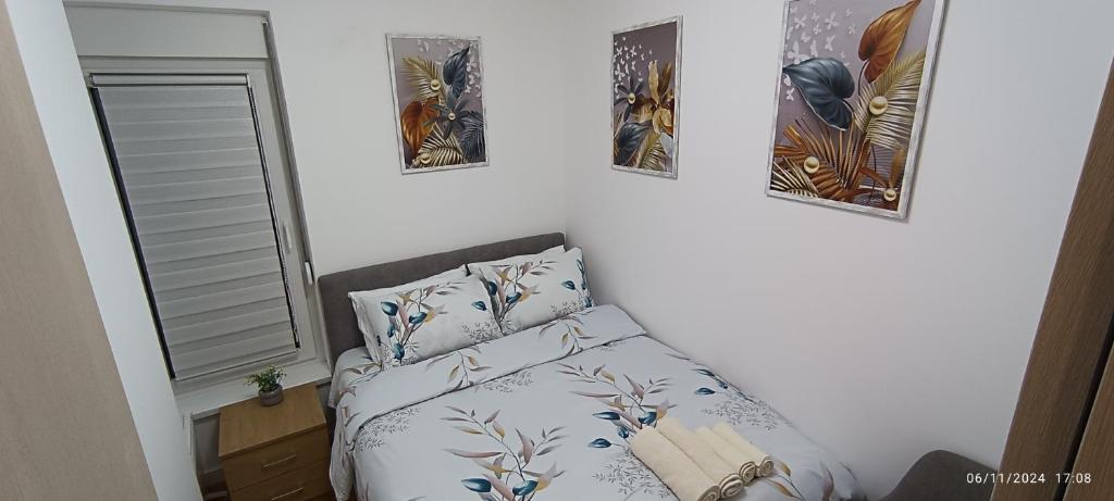Una cama o camas en una habitación de Picasso Divcibare Kota 992