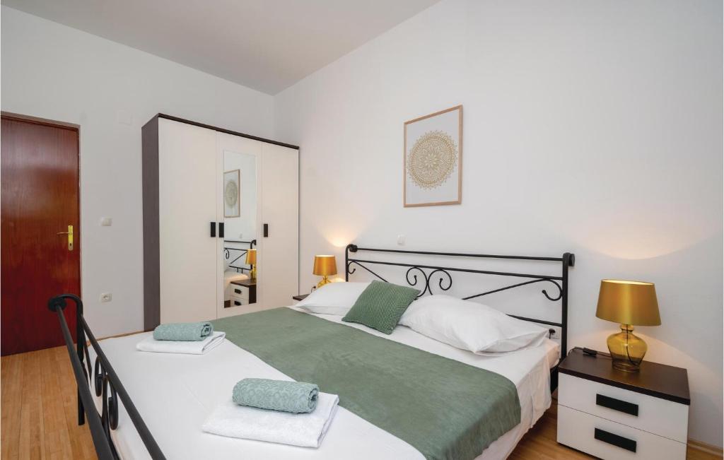 Postel nebo postele na pokoji v ubytování Apartment Prizba Bb Ii