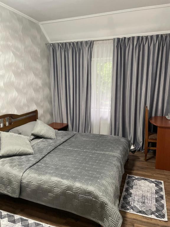 Postel nebo postele na pokoji v ubytování Best House