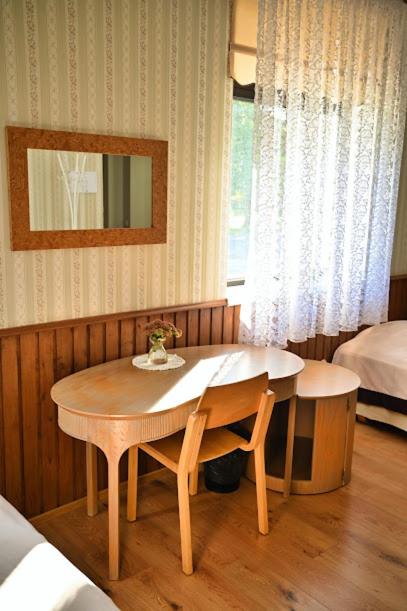 Postel nebo postele na pokoji v ubytování Vinni Hostel