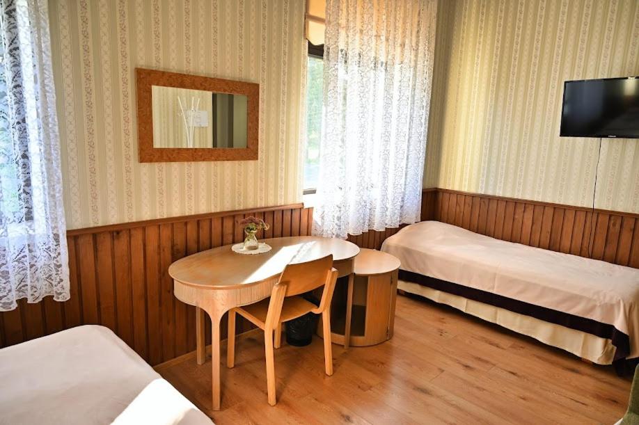 Postel nebo postele na pokoji v ubytování Vinni Hostel