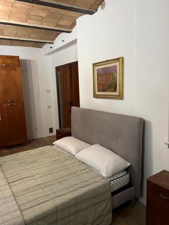Postel nebo postele na pokoji v ubytování Assisi, da Lisetta