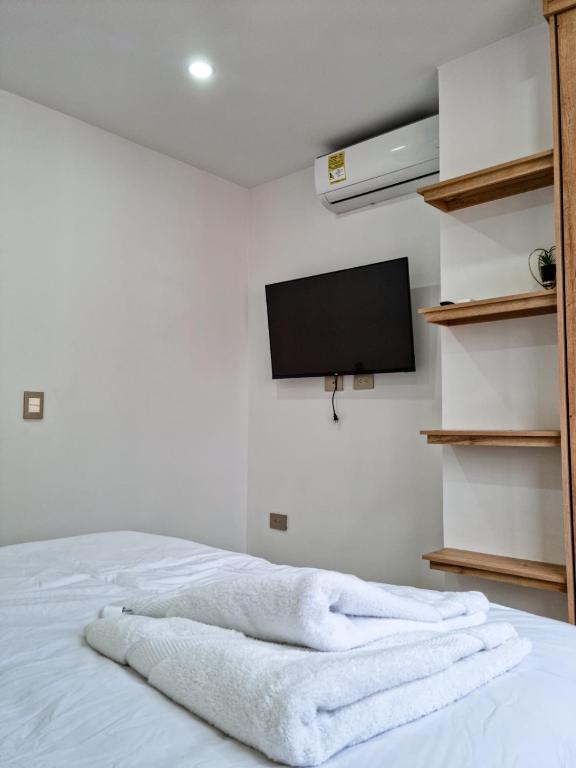 Postel nebo postele na pokoji v ubytování Hotel STATION 23