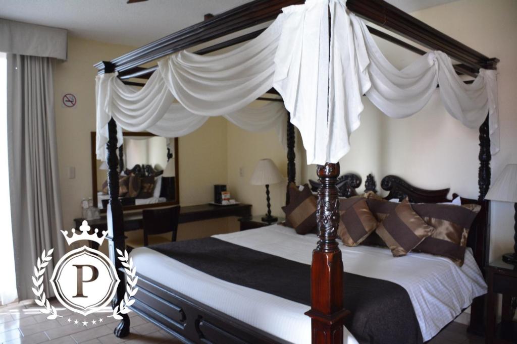 Postel nebo postele na pokoji v ubytování Hotel Posada Virreyes