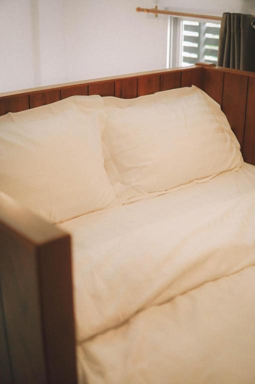 Postel nebo postele na pokoji v ubytování Psych Hostel