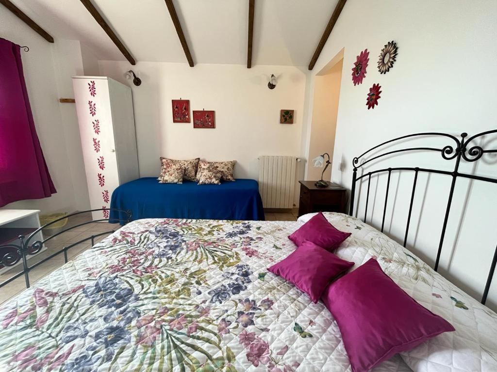 Postel nebo postele na pokoji v ubytování A Casa di Amici