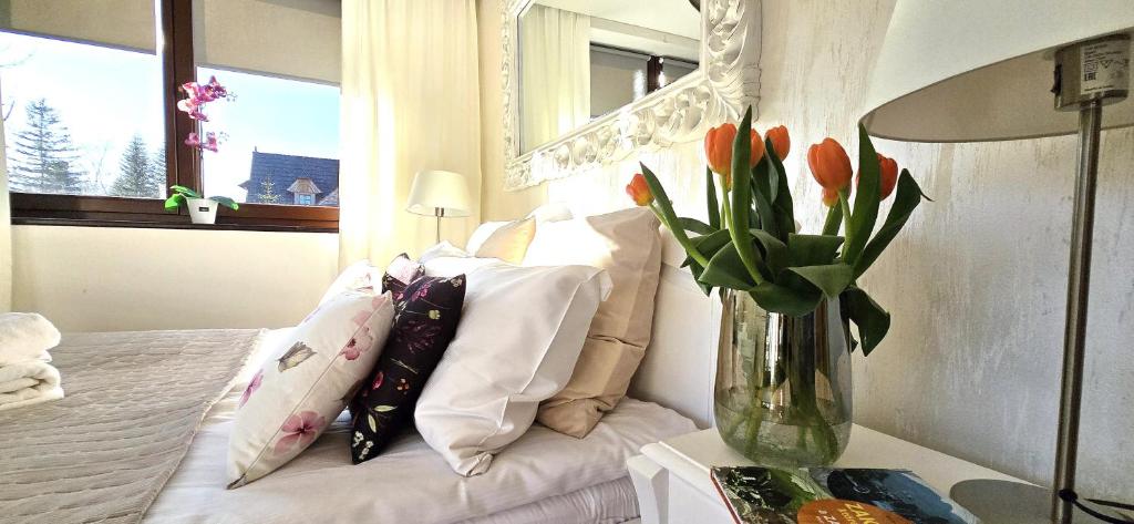 Posteľ alebo postele v izbe v ubytovaní VIP Apartamenty Widokowe
