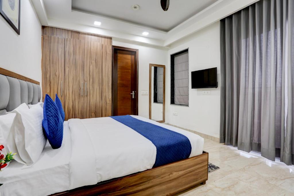 Postel nebo postele na pokoji v ubytování Hotel Grey Medicity Modern Rooms, Prime Location, Affordable Rates I Near Medanta