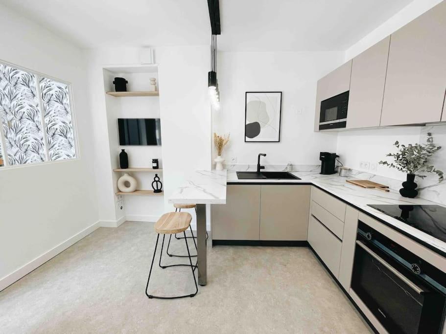 Køkken eller tekøkken på Studio Vieille Ville - 300m du Lac