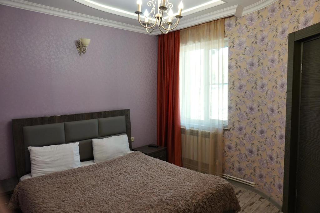 Postel nebo postele na pokoji v ubytování Чичхани, Chichkhani, Չիչխանի