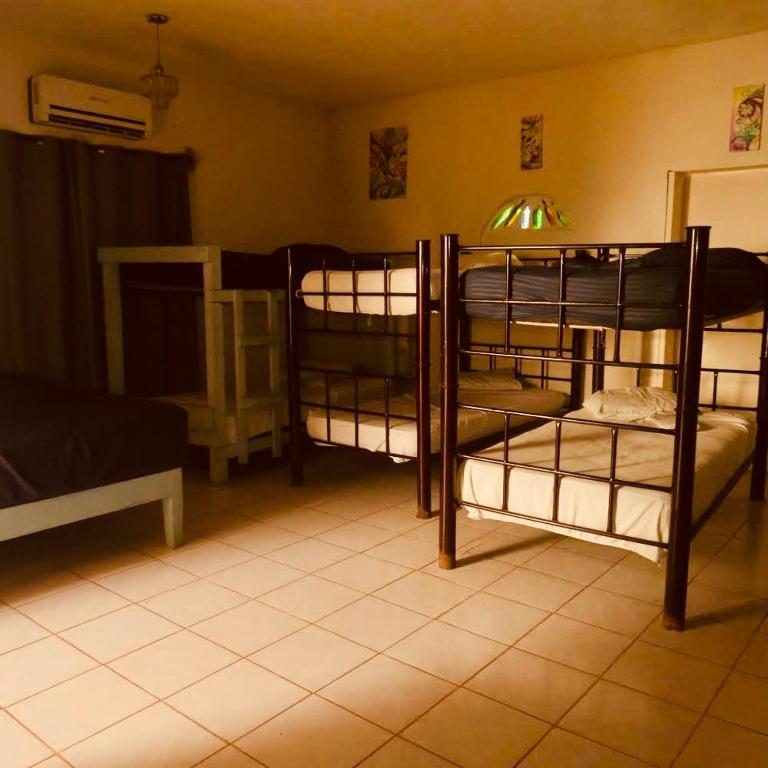 Postel nebo postele na pokoji v ubytování Hostalito Lahar