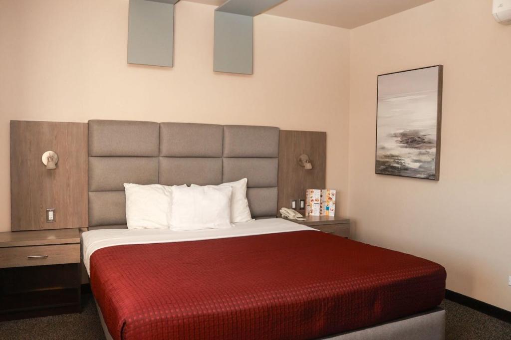 Postel nebo postele na pokoji v ubytování Hotel Jatay