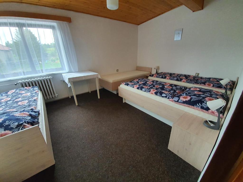 Postel nebo postele na pokoji v ubytování Ubytování Hilšer