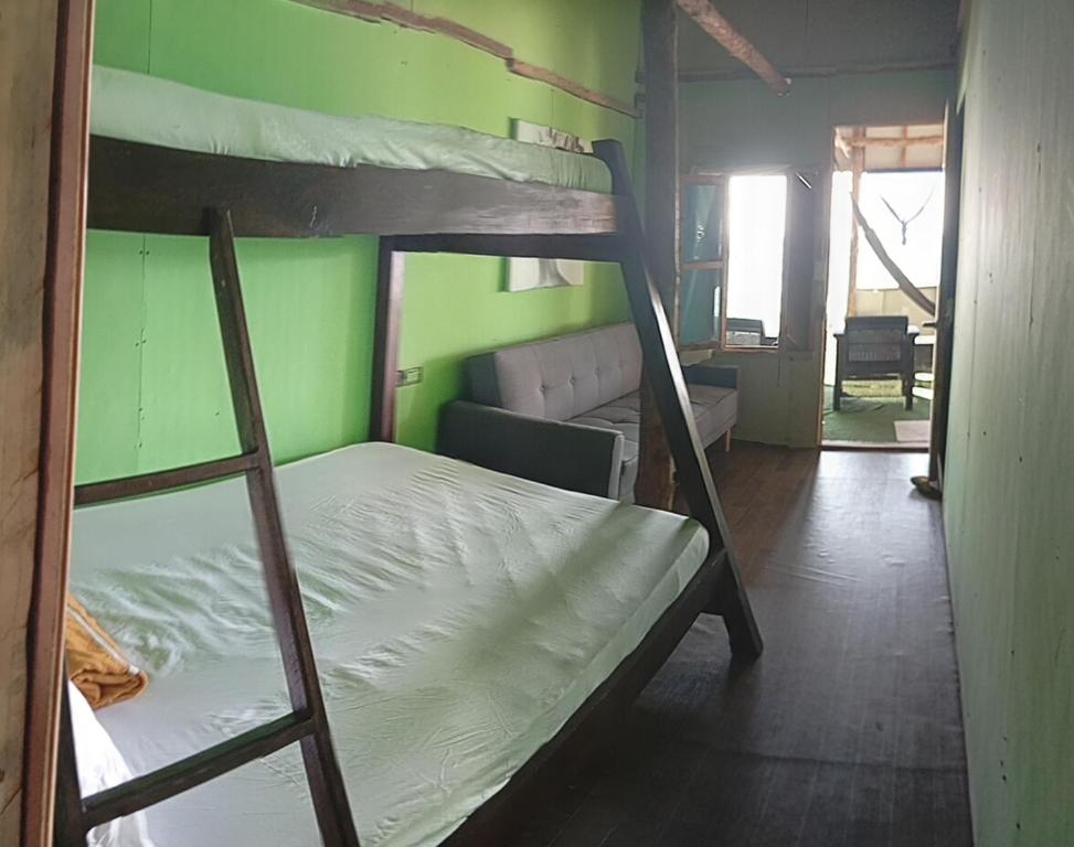 Una cama o camas en una habitación de Cabañas Palos Locos