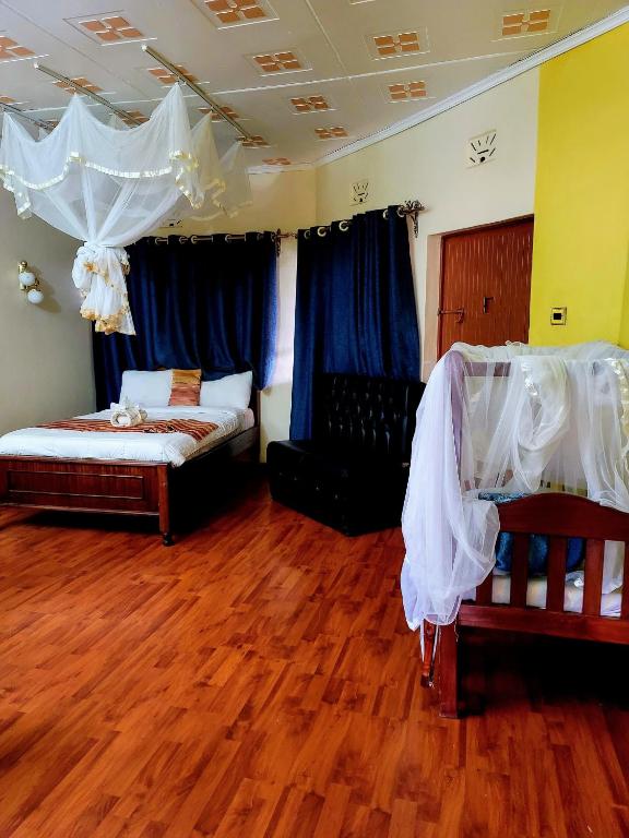 Postel nebo postele na pokoji v ubytování Apex Resort