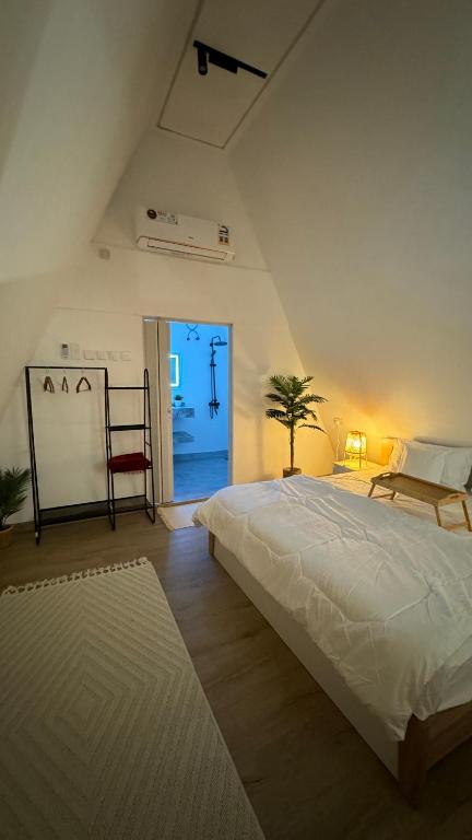 Postel nebo postele na pokoji v ubytování sandhut77