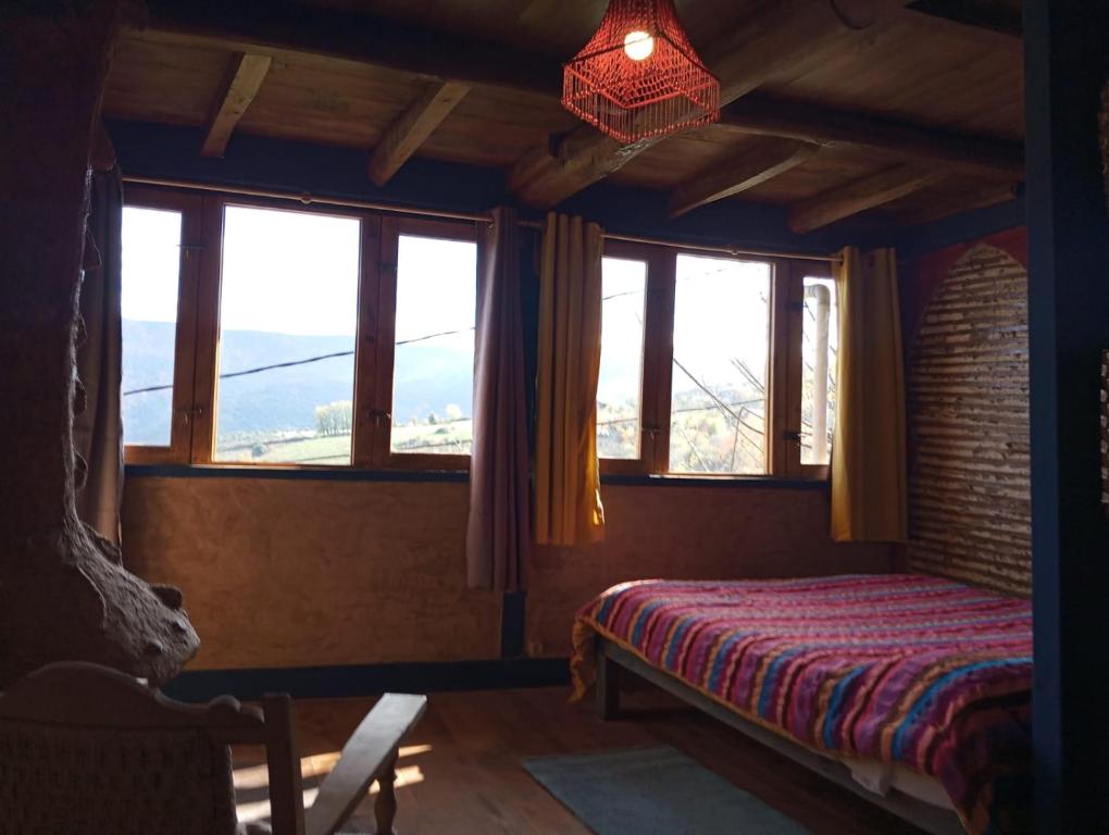 Postel nebo postele na pokoji v ubytování Louteiro de las Médulas