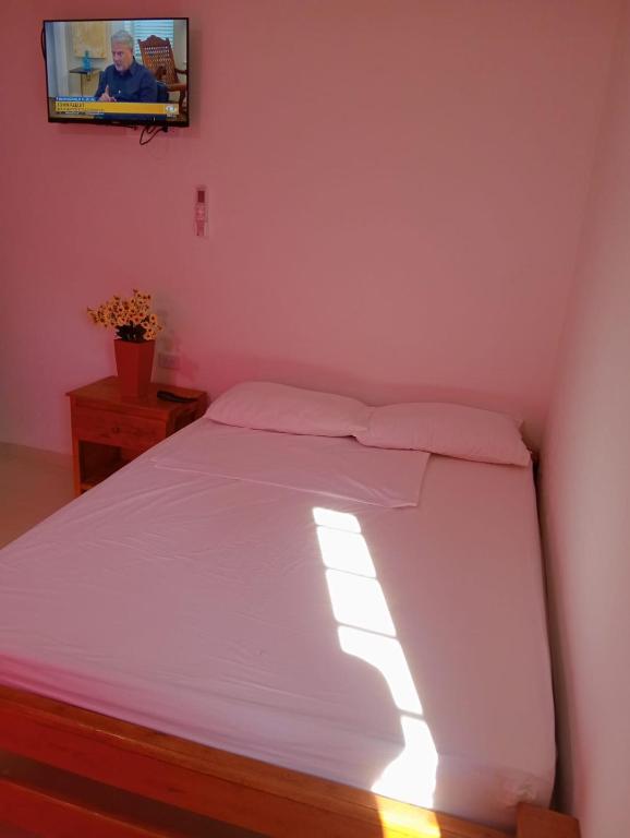 Postel nebo postele na pokoji v ubytování Apartamentos Datalu