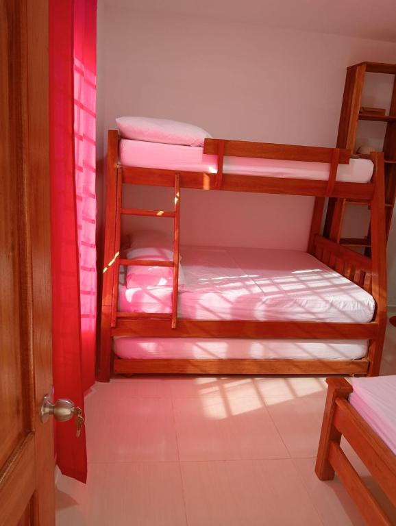 Postel nebo postele na pokoji v ubytování Apartamentos Datalu