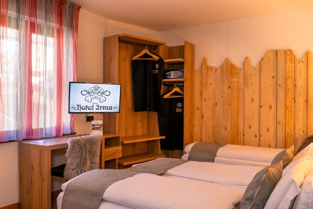 TV a/nebo společenská místnost v ubytování Hotel Irma