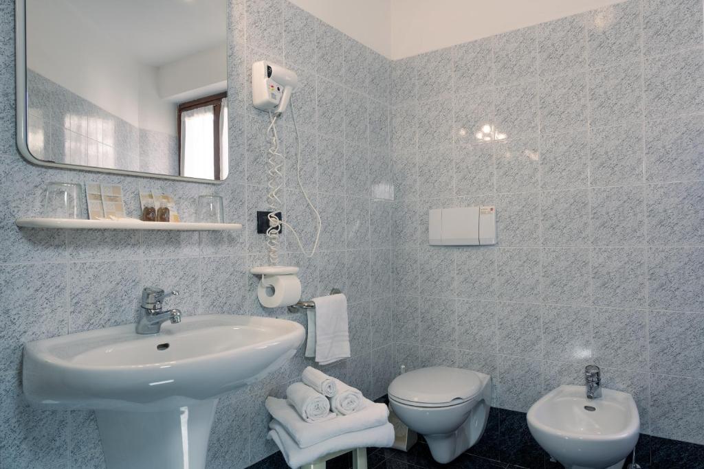 Koupelna v ubytování Hotel Irma