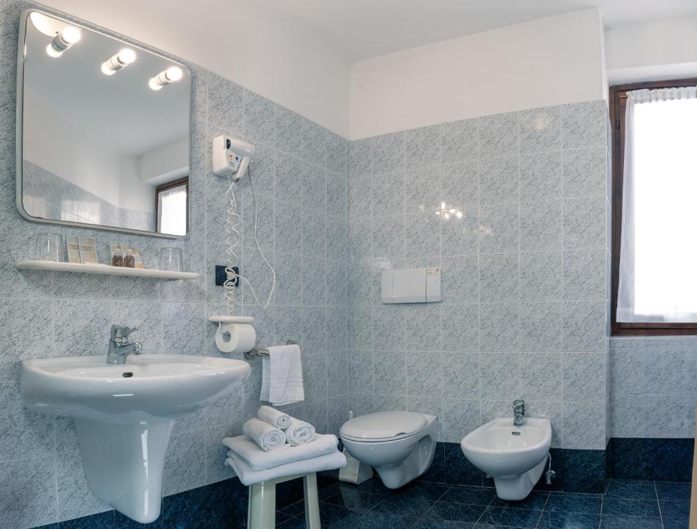 Koupelna v ubytování Hotel Irma