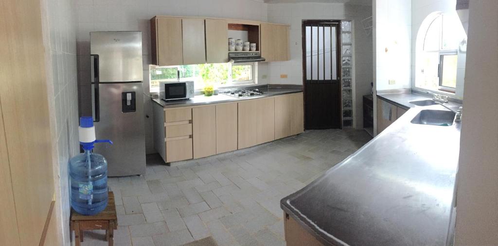 Kuchyň nebo kuchyňský kout v ubytování Coral House SAI