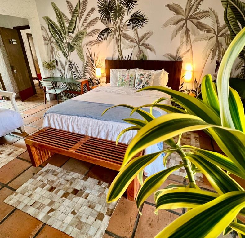 Postel nebo postele na pokoji v ubytování Hotel Casa Paradiso Guarujá