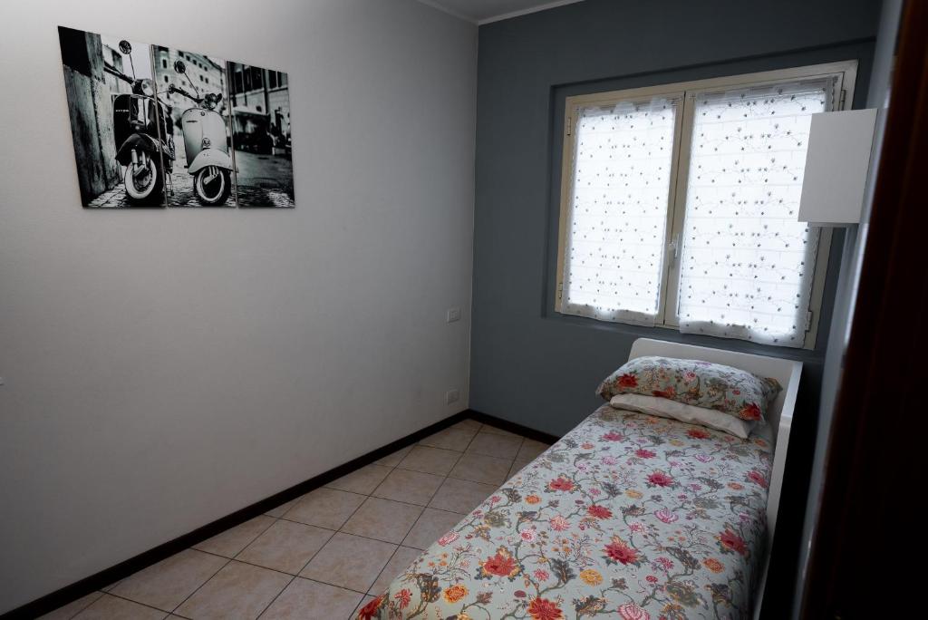 Postel nebo postele na pokoji v ubytování Garibaldi 26