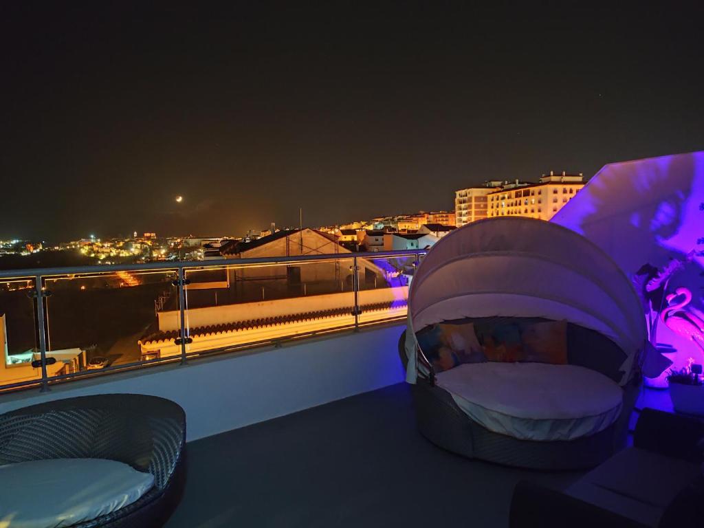 A balcony or terrace at ÁTICO RILQUE, Apartamentos Independientes con Jacuzzi Privado y Terraza en Ronda