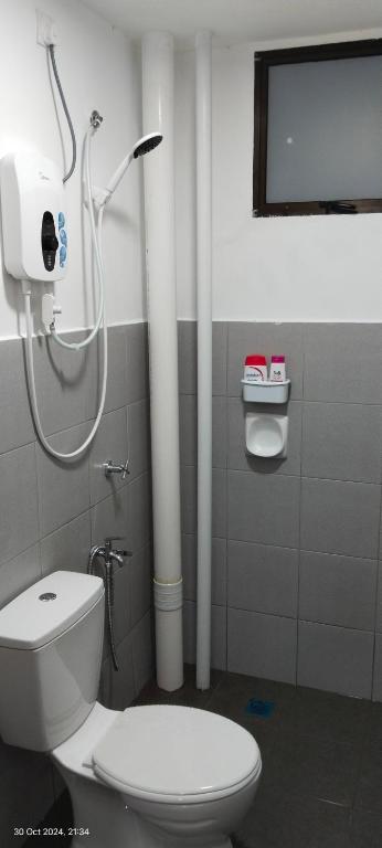 Koupelna v ubytování Nana Homestay