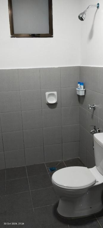 Koupelna v ubytování Nana Homestay