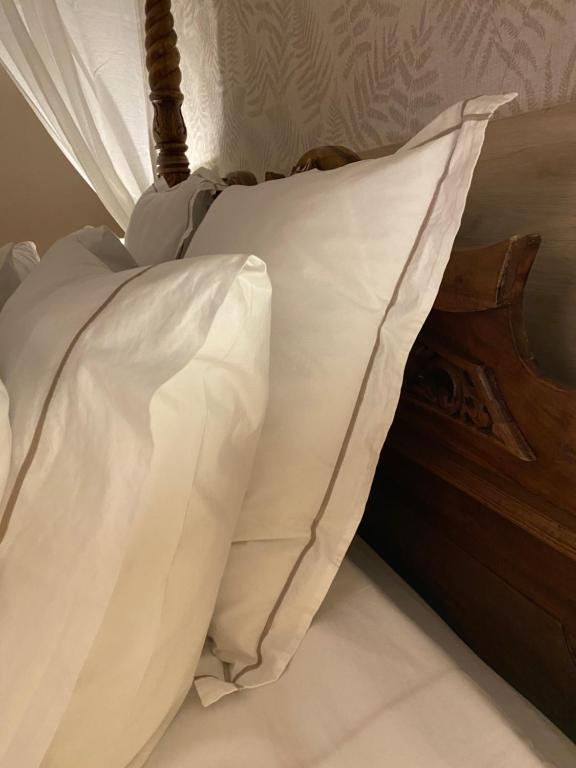 Uma cama ou camas num quarto em Hotel Lusitano
