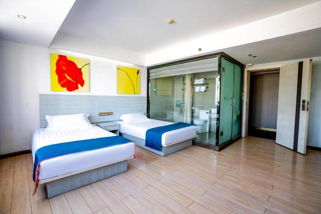 Postel nebo postele na pokoji v ubytování Juli Boutique Hotel