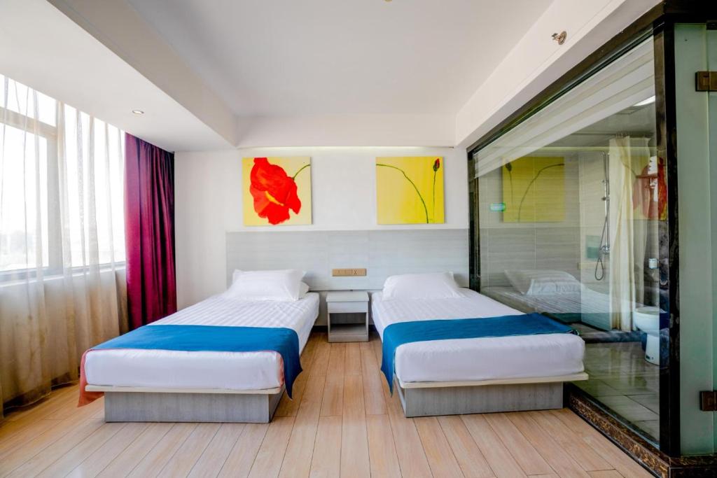 Postel nebo postele na pokoji v ubytování Juli Boutique Hotel
