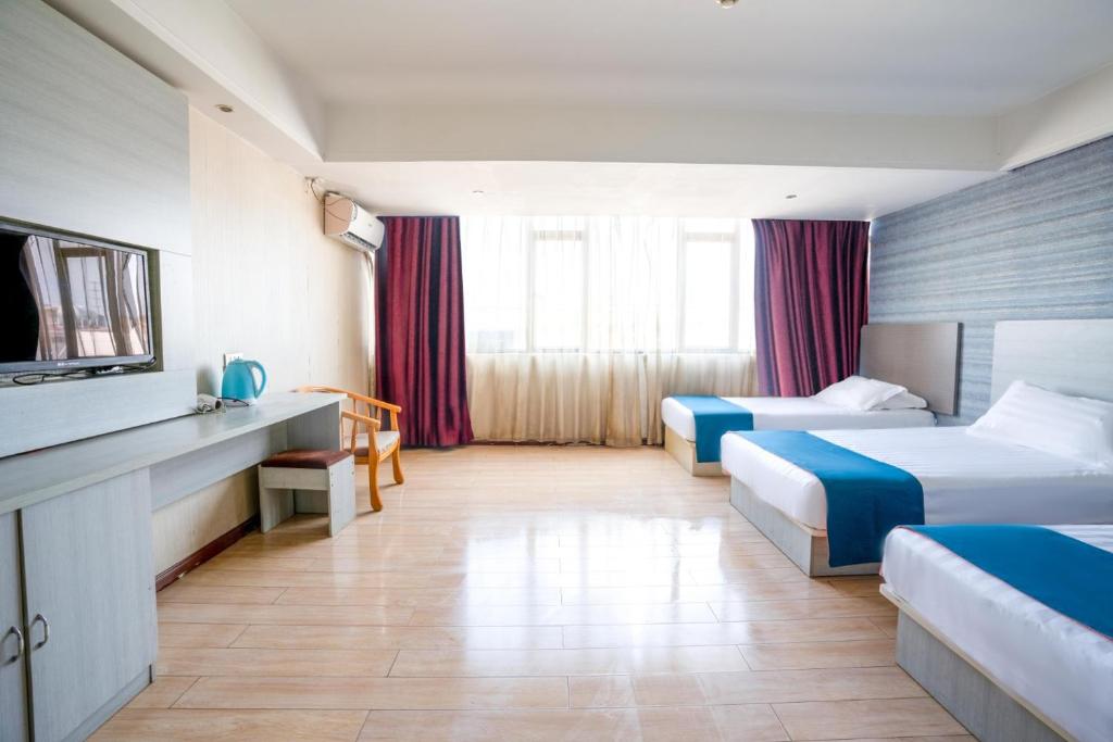 Postel nebo postele na pokoji v ubytování Juli Boutique Hotel