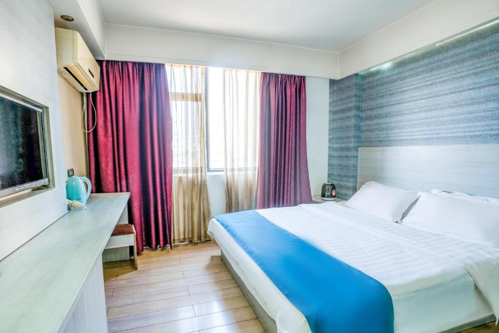 Postel nebo postele na pokoji v ubytování Juli Boutique Hotel