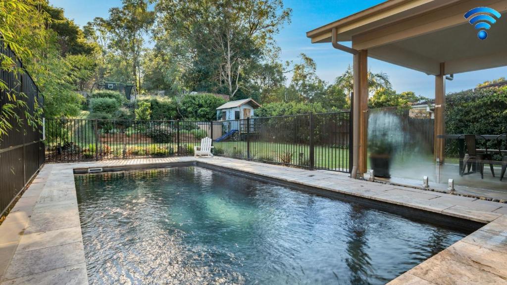 Πισίνα στο ή κοντά στο Blissful Bungalow