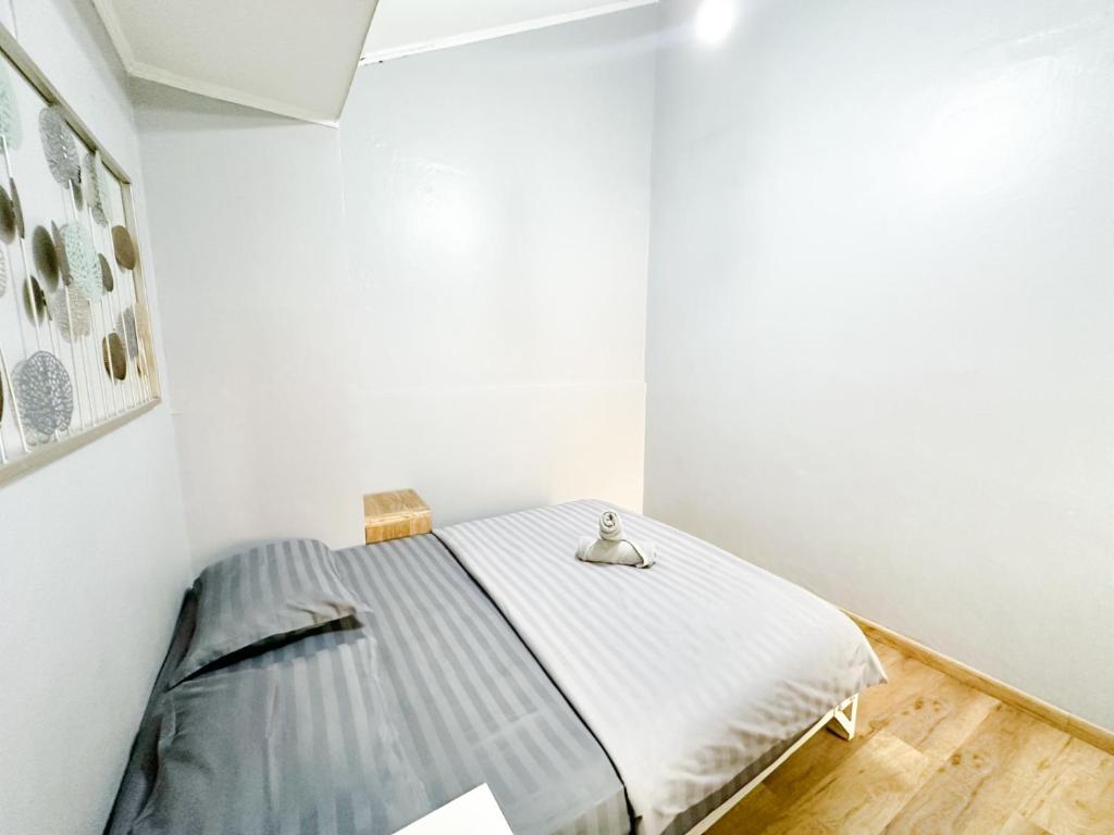 Postel nebo postele na pokoji v ubytování Otu Hostel By Ostic