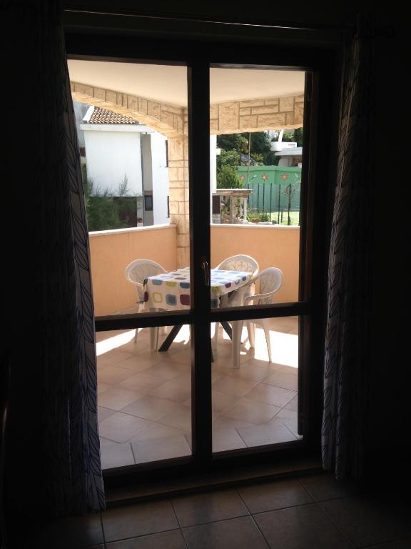 Ein Balkon oder eine Terrasse in der Unterkunft Apartments Villa Kristina