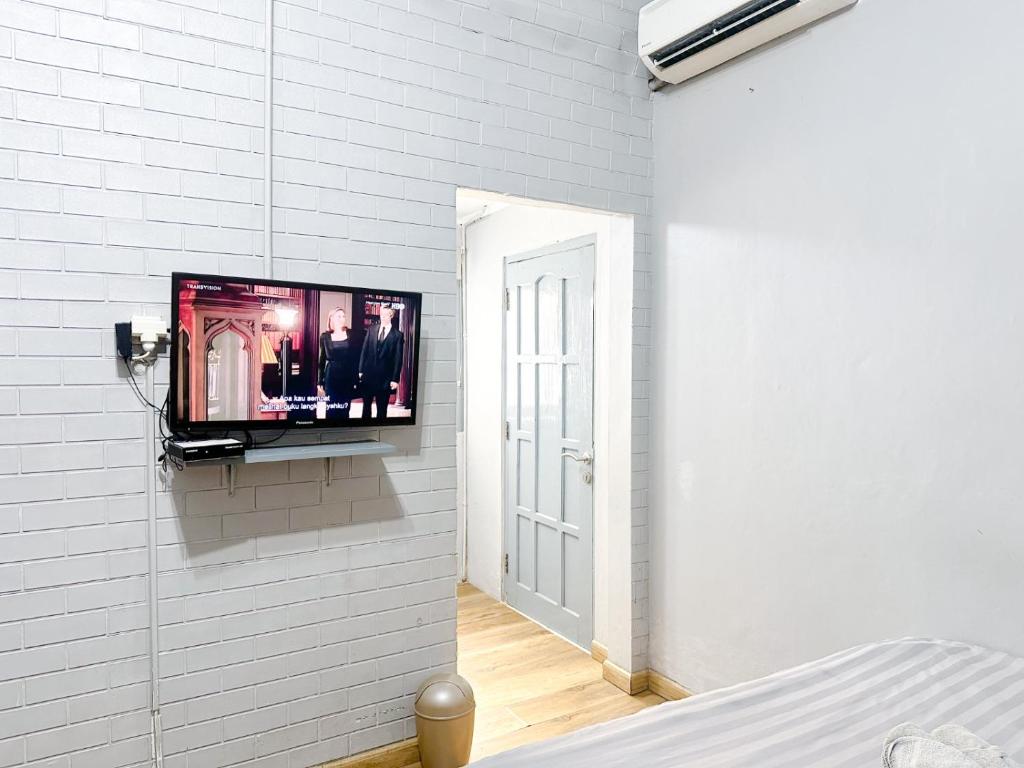 TV a/nebo společenská místnost v ubytování Otu Hostel By Ostic