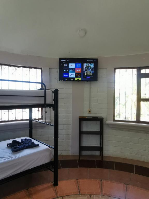 Postel nebo postele na pokoji v ubytování Mitico El Castillo